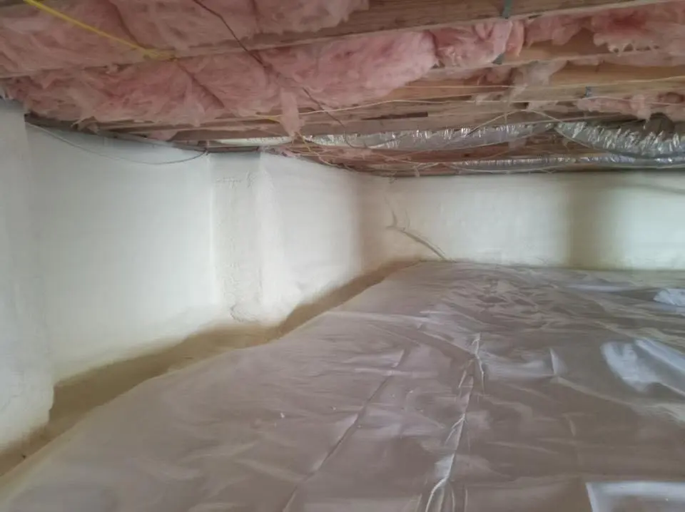 Crawl space encapsulation with closed-cell spray foam for Commercial Roof Restoration in Norwood